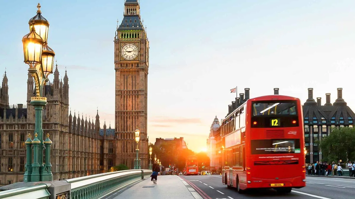 Walking tour group crossing Westminster Bridge on a London 2 day itinerary